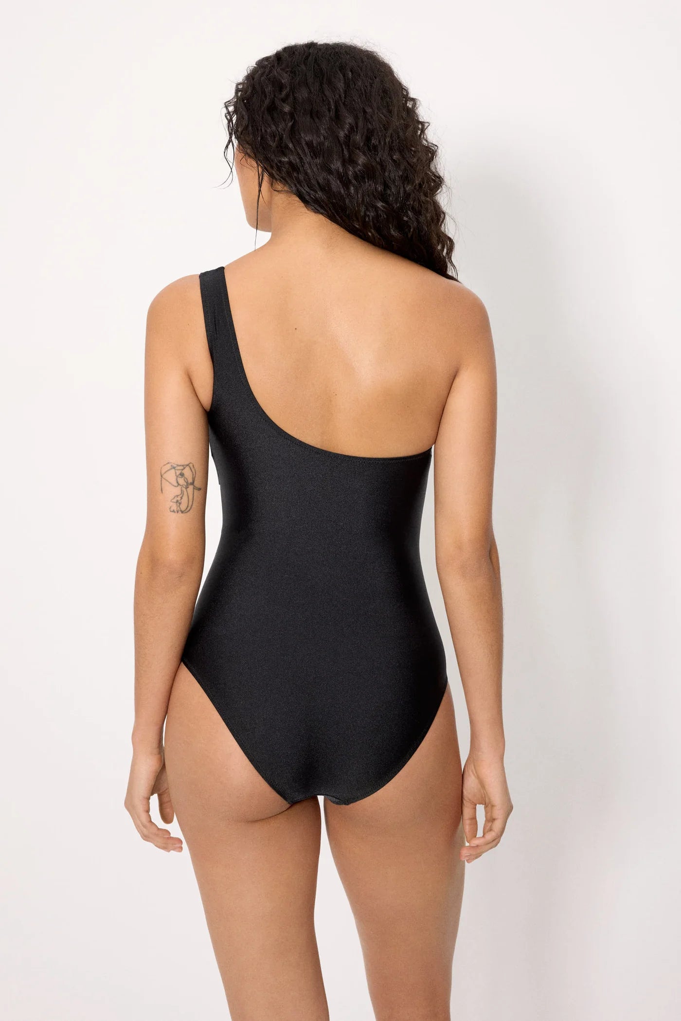 Bañador negro asimétrico con tul transparente con brillo negro copa B
